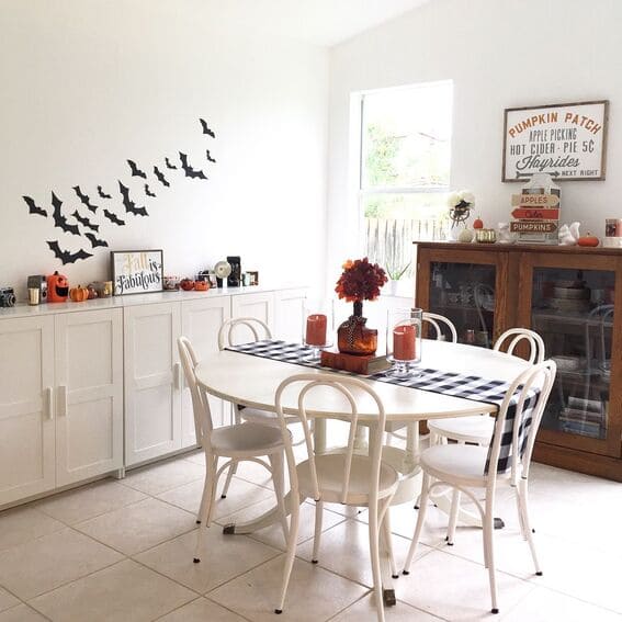 Bright dining room with simple Halloween touches. 