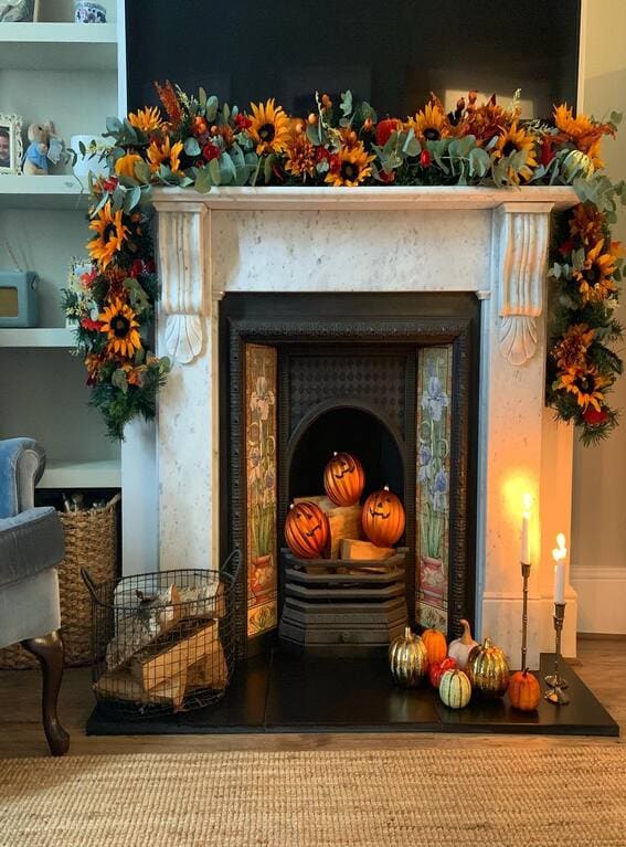 A bold and vibrant fall mantel garland featuring sunflowers, eucalyptus, and autumnal accents, bringing a warm and festive look to the fireplace. 