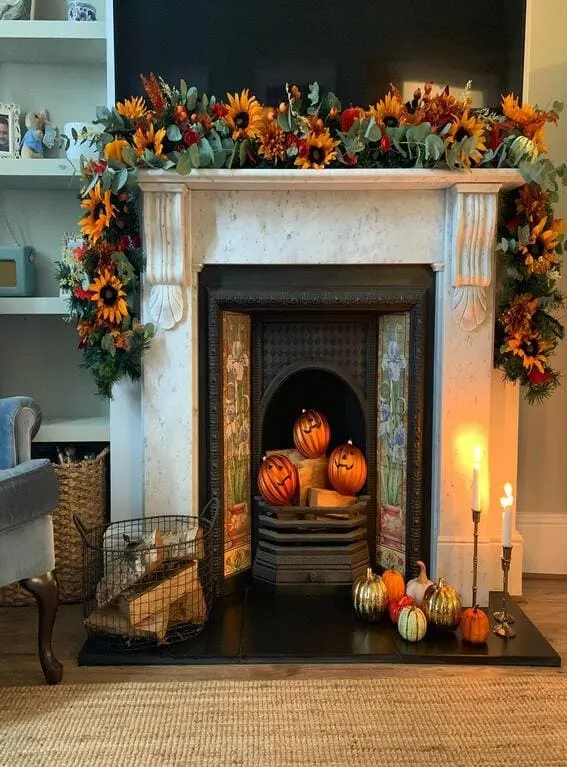 A bold and vibrant fall mantel garland featuring sunflowers, eucalyptus, and autumnal accents, bringing a warm and festive look to the fireplace. 