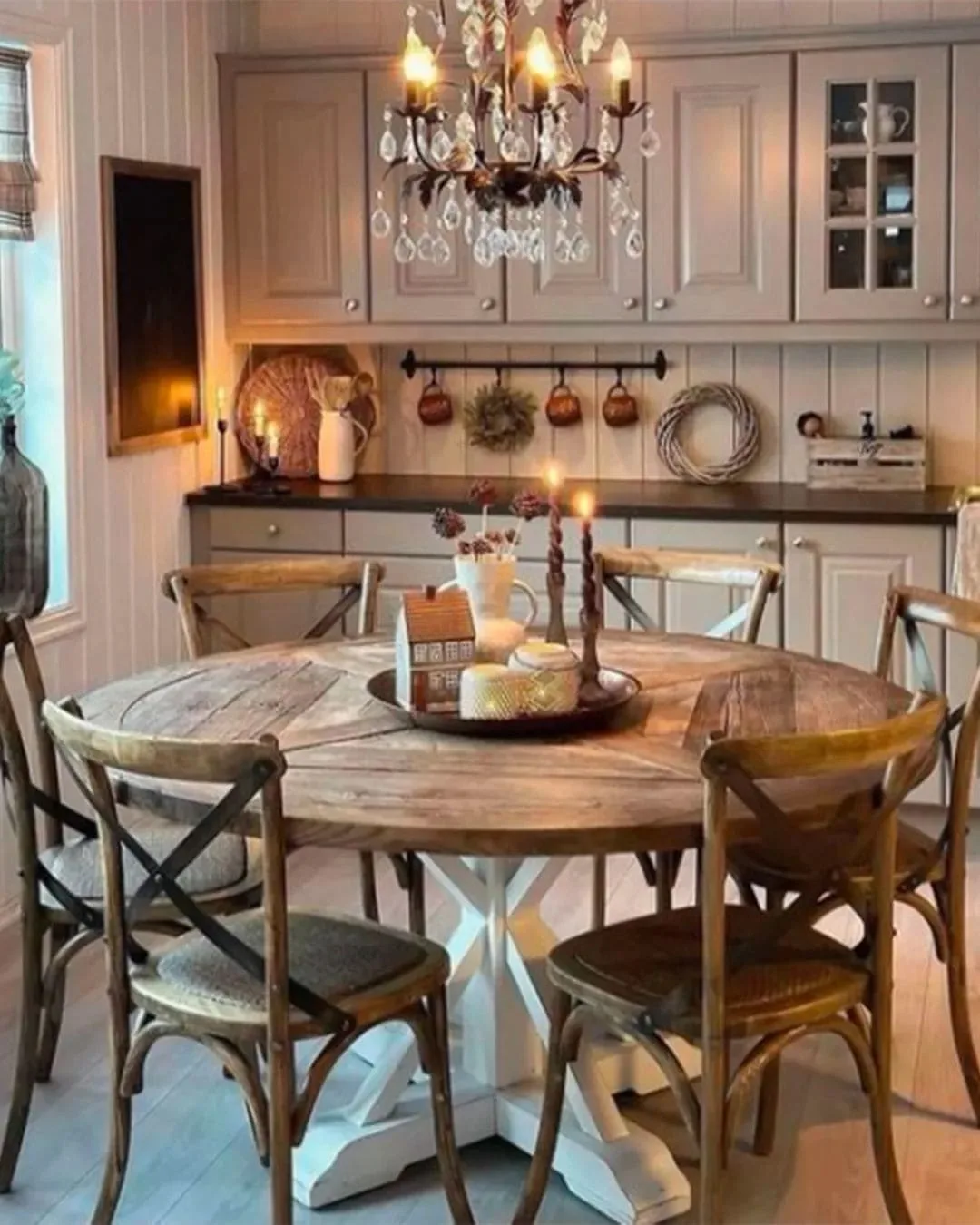 This image is a great idea for adding Scandinavian touches to a farmhouse dining room, with minimalist decor and neutral tones for a serene feel.Farmhouse dining room decor inspiration by @elinstad / Instagram