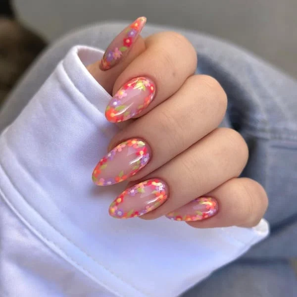 spring nails with bright floral confetti